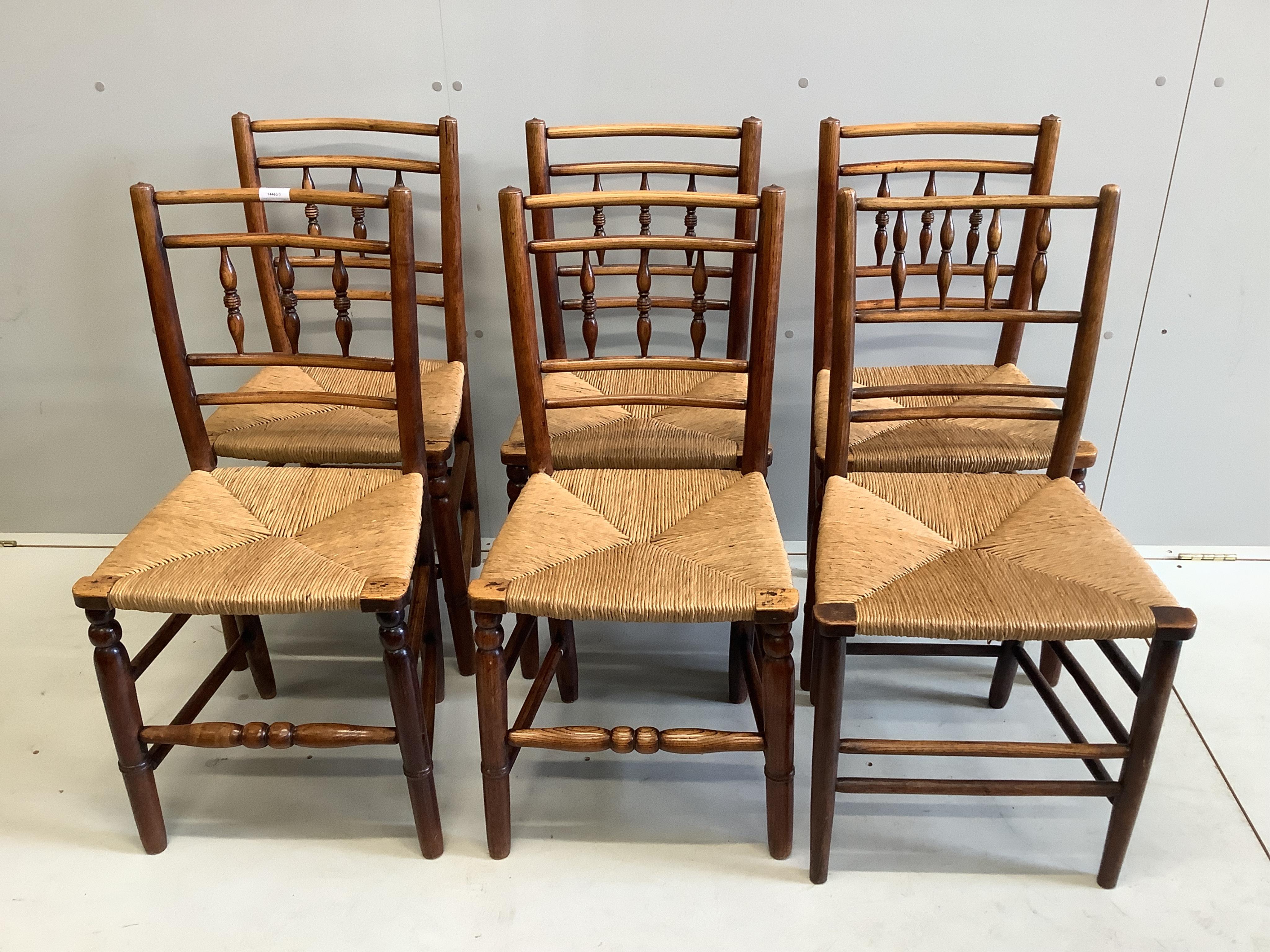 Six early 19th century (five plus one) ash rush seat chairs, width 41cm, depth 34cm, height 86cm. Condition - good